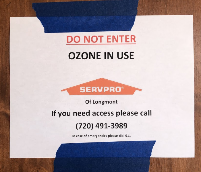 a sign that says stay out, ozone in use